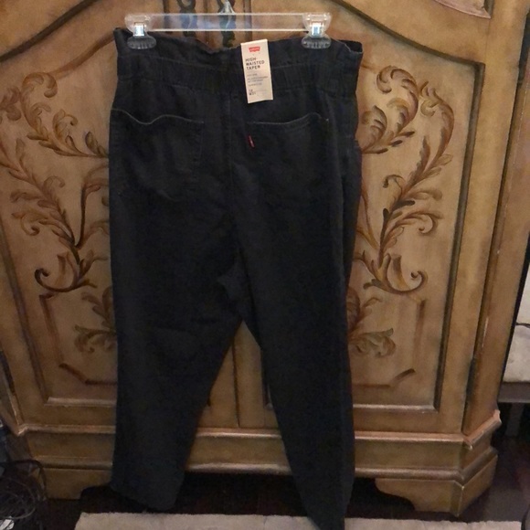 SOLD.Levi’s High Waisted Taper Jeans - Picture 7 of 15